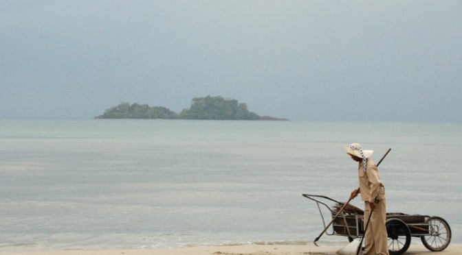Man walking on the shore